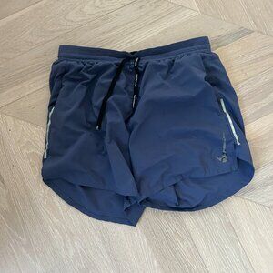 Set of two Nike running shorts in grey and purple